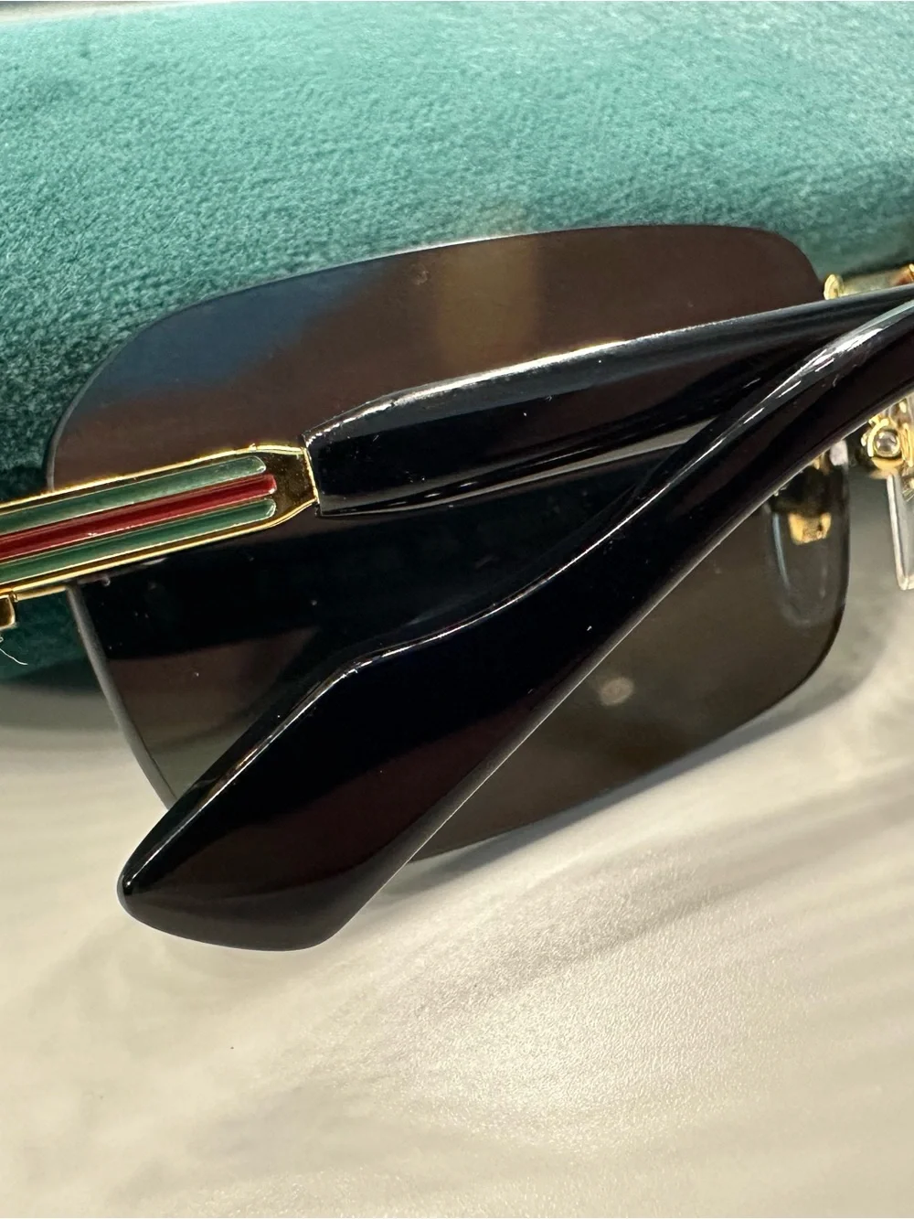 Gucci Men’s Rimless Sunglasses - Black and Gold